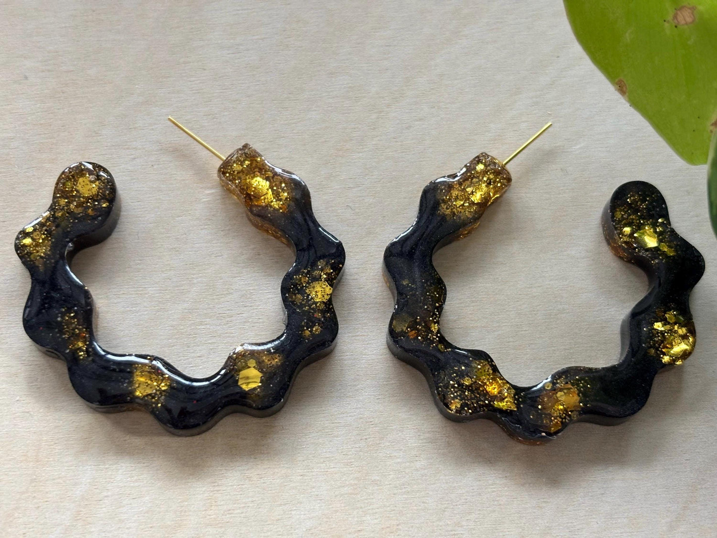 Elegant black and gold hoops