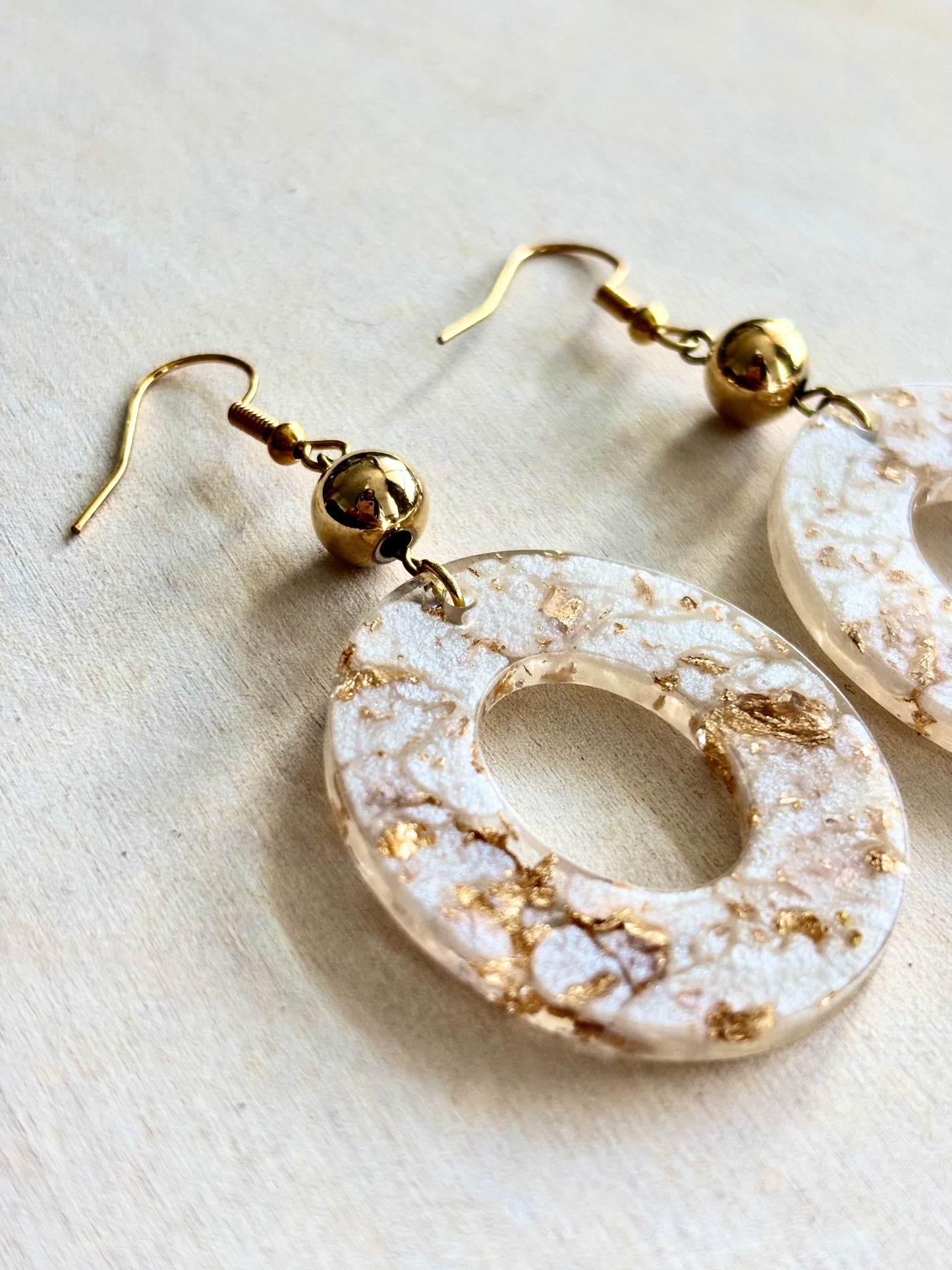 Gold and white oval dangles