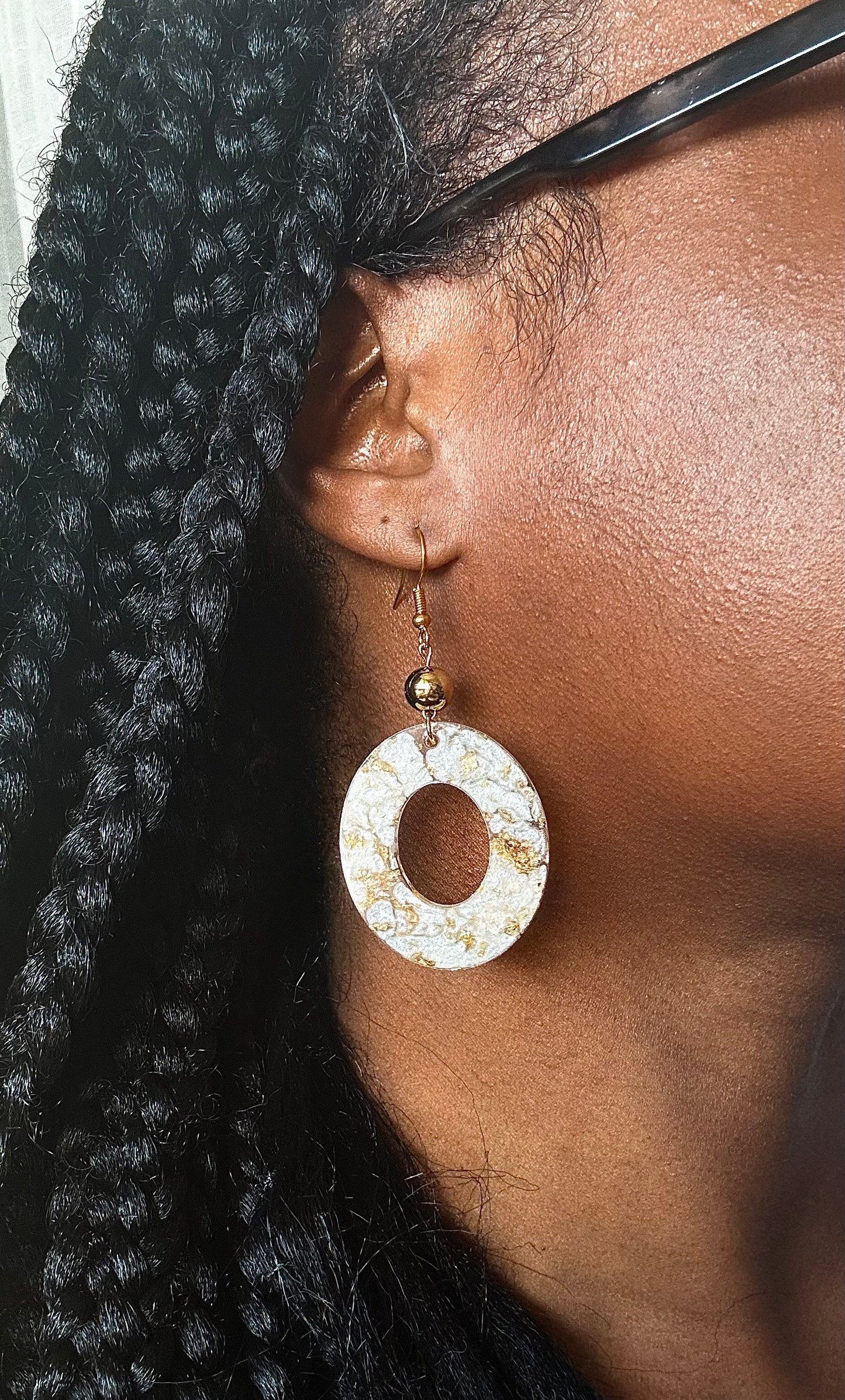 Gold and white oval dangles