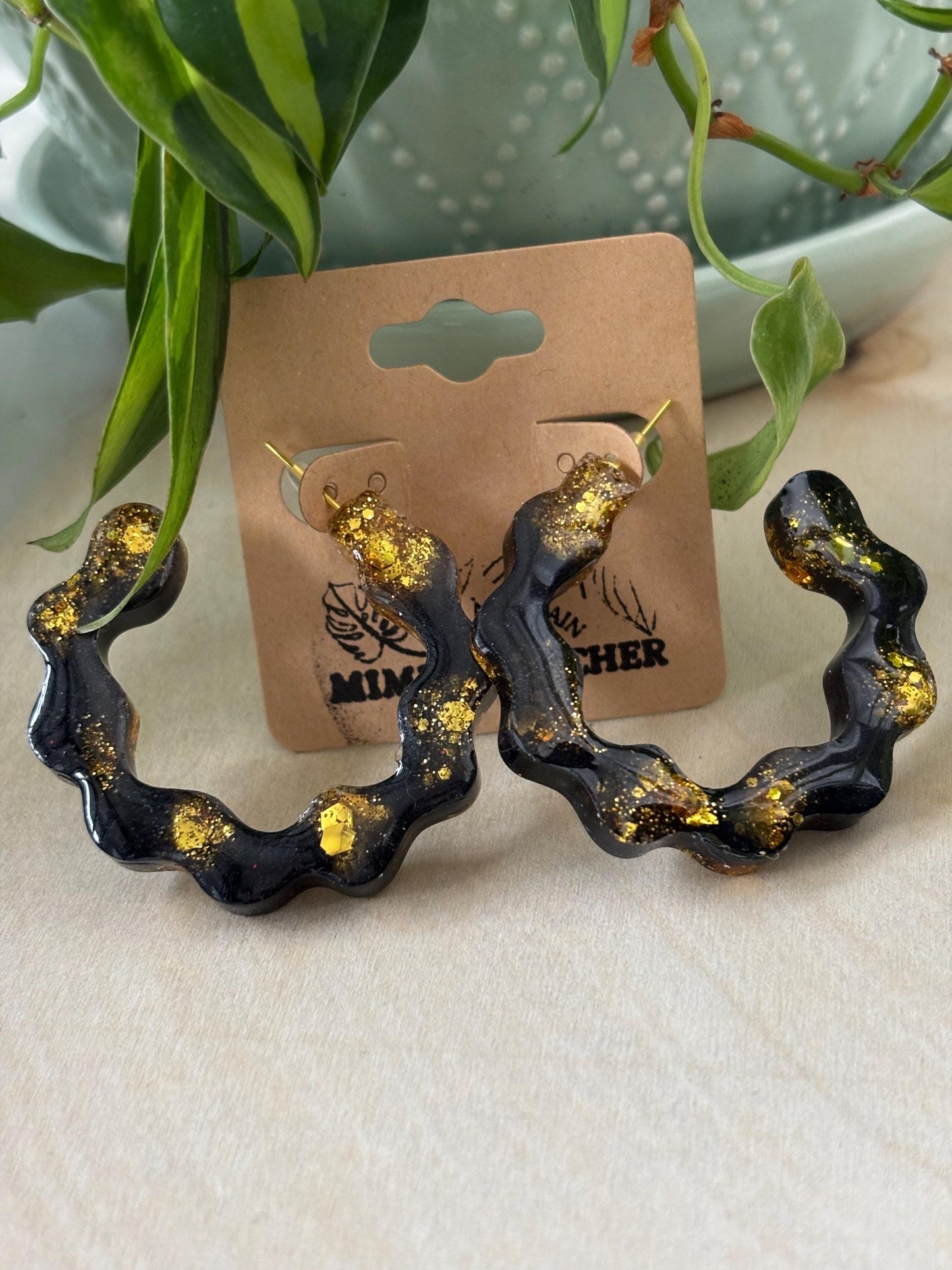 Elegant black and gold hoops