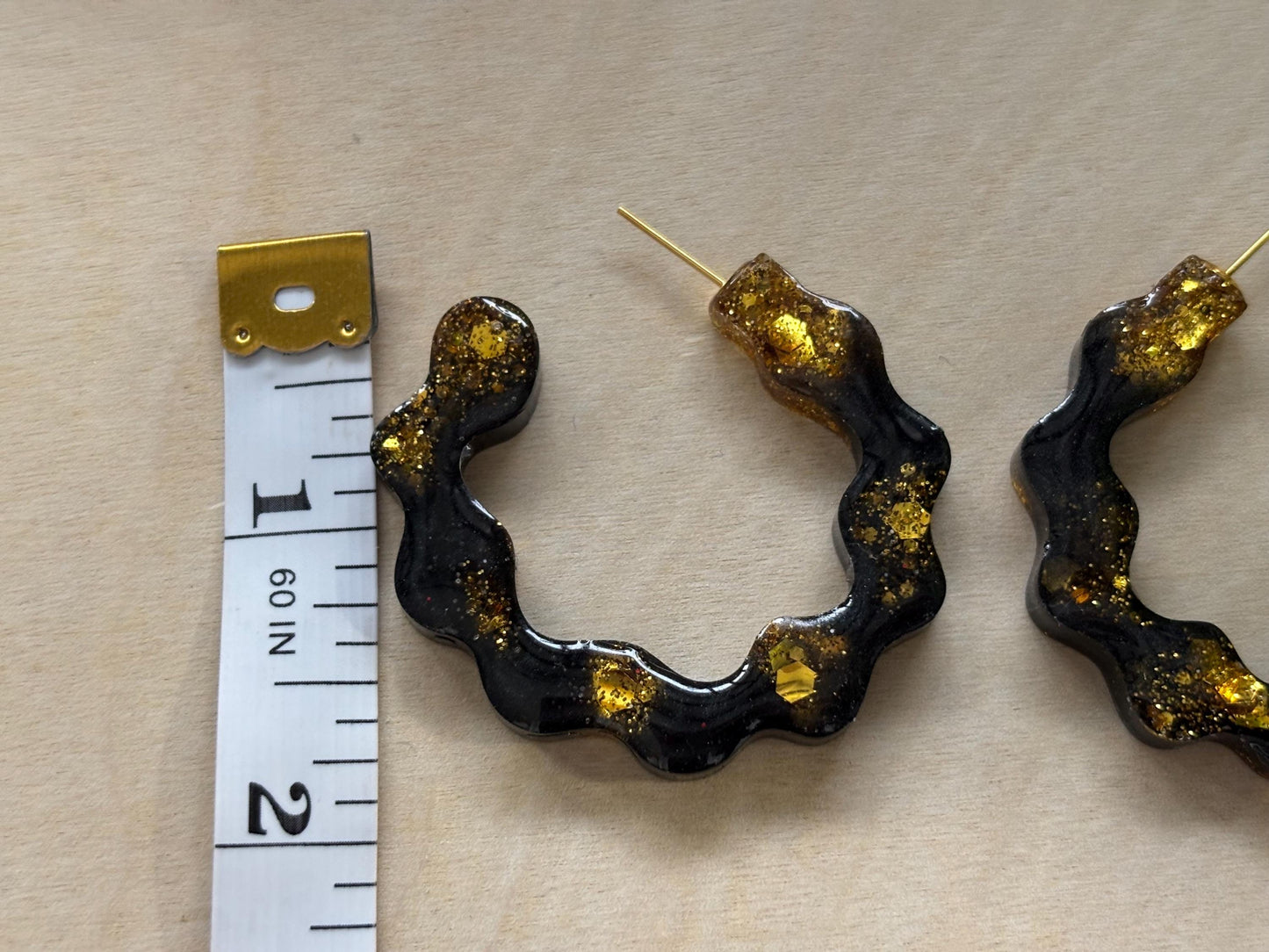 Elegant black and gold hoops